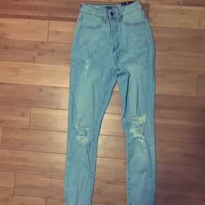 Ripped light blue jeans